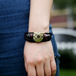 Punk style Cancer zodiac leather bracelet with bronze charms and wooden beads on wrist
