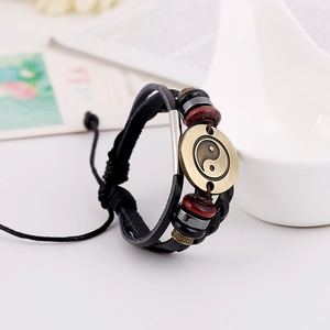 Punk leather bracelet with bronze Tai Chi Yin Yang charm and braided multilayer cords