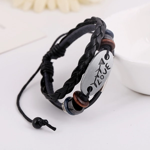 Punk vintage black leather beaded bracelet featuring aged metal plate and LOVE engraving