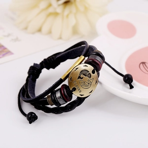 Pisces zodiac leather bracelet with bronze metal charm and braided black cords