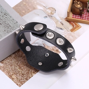 Men's punk black leather bracelet featuring silver metal spikes and adjustable snap buttons