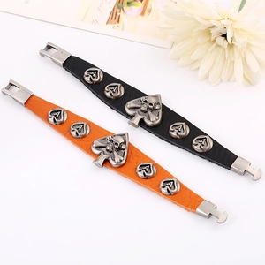 Bracelet punk en cuir vintage avec breloque crâne et cœur en métal noir et orange