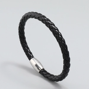 Minimalist black braided leather bracelet with silver magnetic cylinder clasp for men