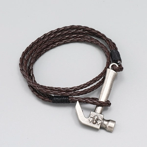 Brown multi-layer braided leather bracelet featuring a vintage silver hammer skull charm