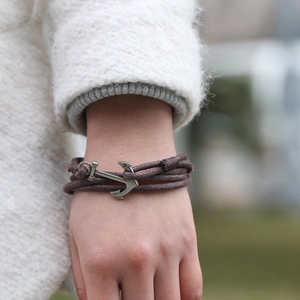 Handmade nautical anchor bracelet with dark brown wax rope and silver metal charm