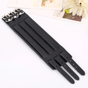 Men's retro punk black wide leather bracelet with triple buckles on a white background