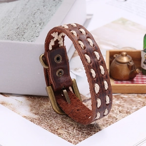 Retro brown braided leather bracelet with vintage bronze buckle and white stitching detail