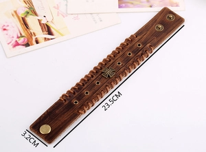 Retro brown leather cuff bracelet with bronze rivets and cross detail, length 23.5cm