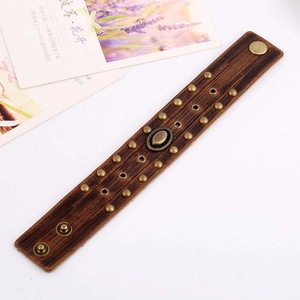 Bracelet manchette punk en cuir marron avec rivets en bronze et pressions réglables
