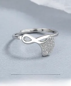Close-up of 925 sterling silver ginkgo leaf ring with sparkling pavé cubic zirconia