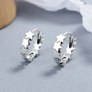 Detailed close-up of 925 sterling silver star-shaped hoop earrings with polished finish