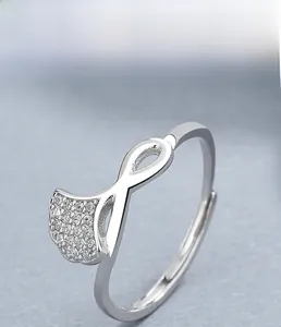 Detailed shot of S925 sterling silver ginkgo leaf ring with micro-paved diamonds