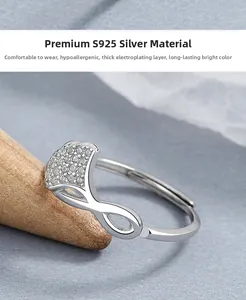Detailed close-up of S925 silver ginkgo leaf ring with sparkling pavé cubic zirconia