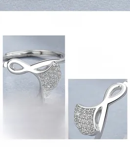 Detailed view of 925 sterling silver ginkgo leaf ring with sparkling pavé cubic zirconia