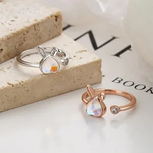 Detail of adjustable S925 silver rabbit rings with heart moonstone and cubic zirconia