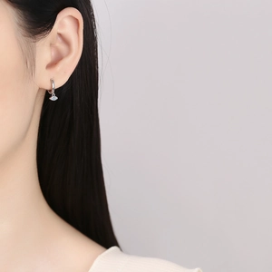 Sterling silver evil eye hoop earrings with blue crystal and white cubic zirconia