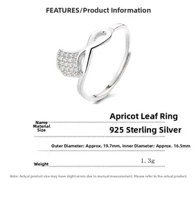 Macro detail of 925 sterling silver ginkgo leaf ring with sparkling zircon inlay