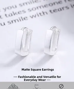 Macro shot of 925 sterling silver square earrings with a brushed matte finish surface