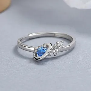 Adjustable 925 sterling silver planet ring with blue heart zircon and white side stones