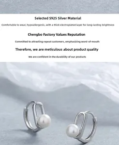 Vue macro de boucles d'oreilles en argent S925 avec perles et crochets ovales élégants