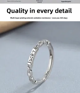 Detailed macro of S925 sterling silver chain ring with lucky engraving and silver finish