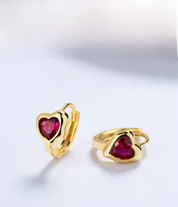 Detailed macro view of heart-shaped red gemstone earrings in S925 sterling silver