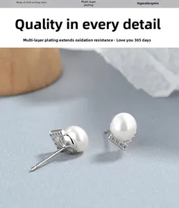 Macro shot of 925 sterling silver pearl earrings with V-shaped zircon micro-inlay
