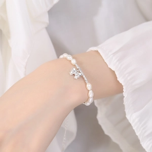 Elegant 925 sterling silver pearl bracelet with bow pendant for women's jewelry