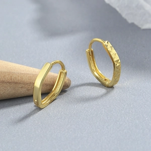 Minimalist 925 sterling silver gold earrings with smooth and geometric faceted texture