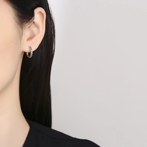 Minimalist 925 sterling silver geometric faceted hoop earrings for women on model