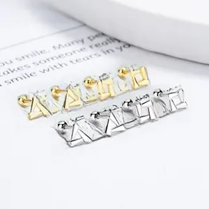 Detailed view of 925 silver geometric stud earrings with secure screw-back ball closures