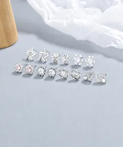 Detail view of 925 silver earring set with star, heart, and zircon motifs for a weekly collection