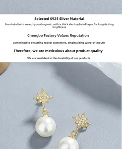 Macro shot of S925 silver starburst stud earrings with white pearls and gold finish