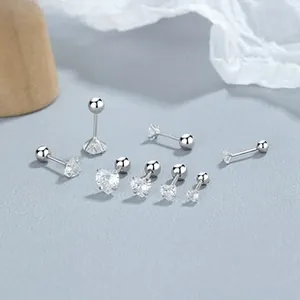 Detailed set of 925 silver heart and round zircon studs with screw-back ball closure