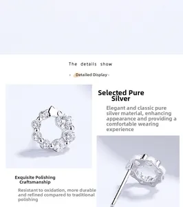 Detailed macro view of 925 sterling silver studs featuring sparkling zircon crystals