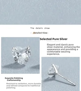 Macro shot of 925 sterling silver heart studs with clear zircon in prong setting