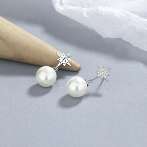 Star-shaped 925 silver stud earrings with round white pearls and sparkling zircon accents