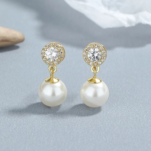 Élégantes boucles d'oreilles en argent 925 doré avec perles et diamants ronds brillants