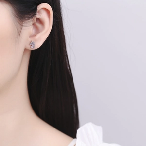 Elegant 925 sterling silver unicorn stud earrings with sparkling purple zircon stones
