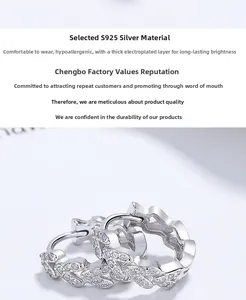 Macro detail of V-shaped wheat ear earrings with S925 silver and sparkling cubic zirconia
