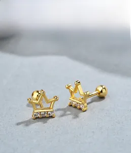 Detail of 925 sterling silver crown screw earrings with clear cubic zirconia stones