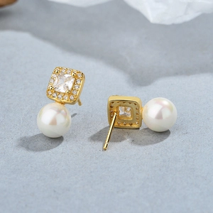Elegant 925 silver gold pearl stud earrings featuring a square zircon and micro-pave crystals