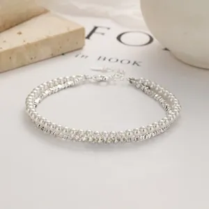 Detail of 925 sterling silver starfish pearl bracelet with double-layer beaded texture