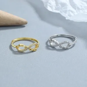 Détails des bagues infini en argent et or avec cristaux de zircone cubique étincelants