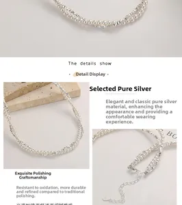 Close-up of S925 sterling silver double-layer necklace with micro pearls and silver beads