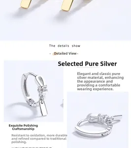 Macro detail of S925 sterling silver twist earring with bow pendant and cubic zirconia