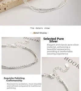 Dettaglio ravvicinato del bracciale multistrato in argento 925 con catena snake e chiusura