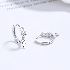 Polished S925 sterling silver twist hoop earrings with bow detail and rectangular tag