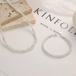 925 silver pearl layered bracelet set featuring a vintage design with white beads