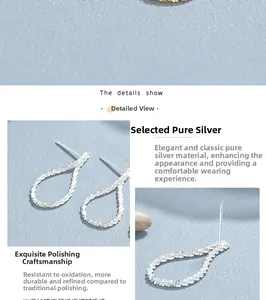 Detail of 925 sterling silver stud earrings with a sparkling textured surface finish